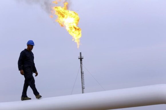 Oil sinks 5% as Moodys banking downgrade drops another shoe on crisis